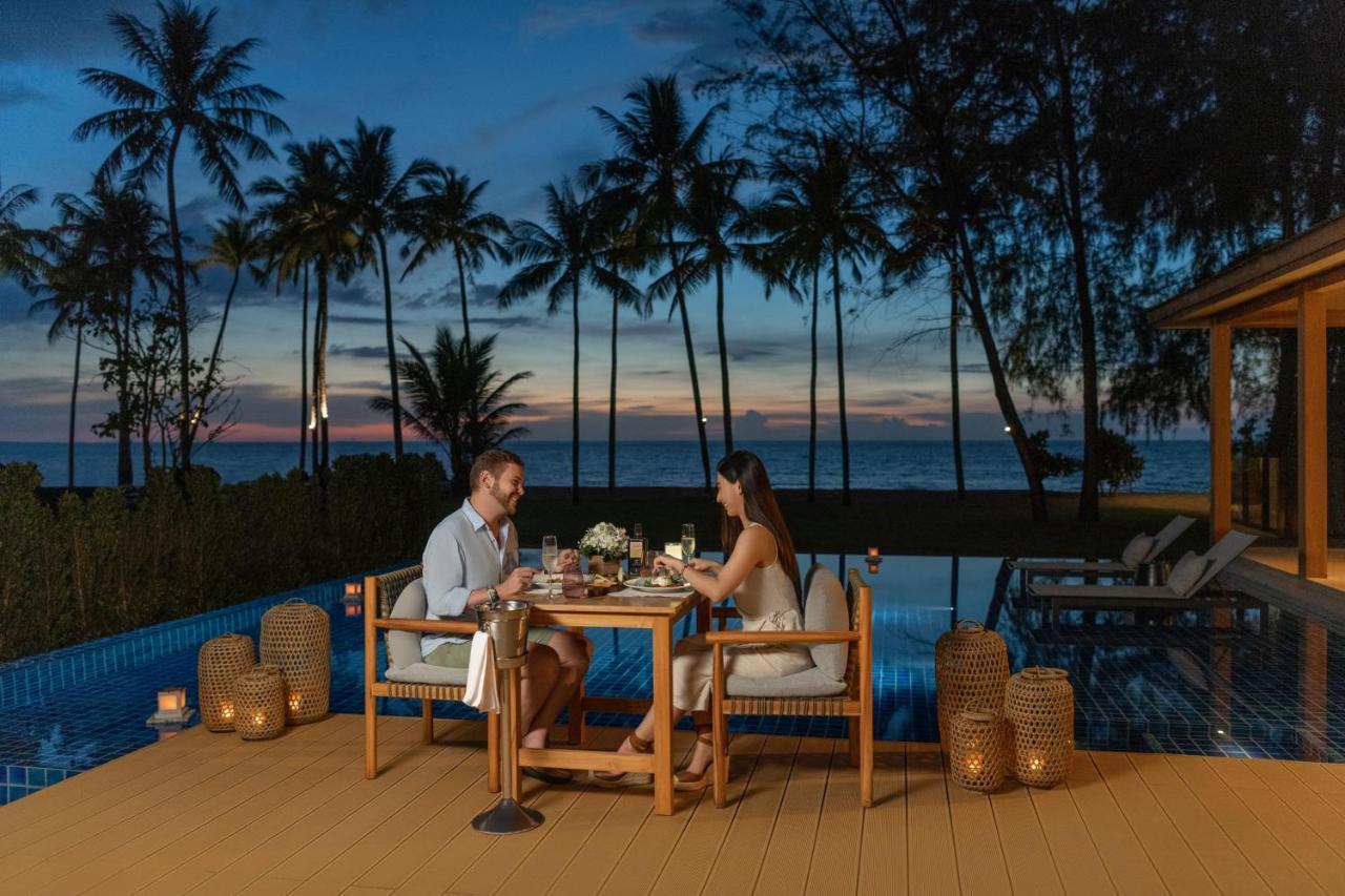 Jw Marriott Khao Lak Resort And Spa Kültér fotó Sunset at the pool